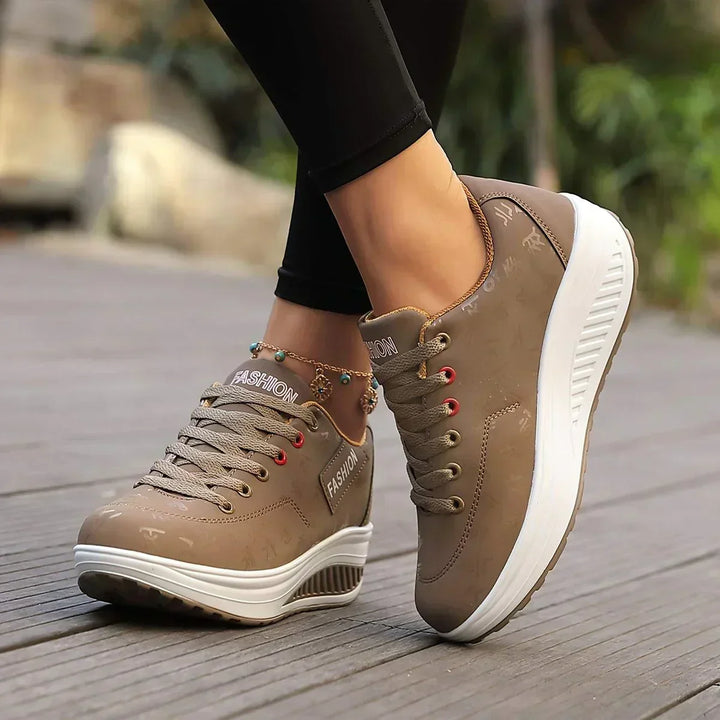 Women's low-top lace-up sneakers with printed uppers and raised soles