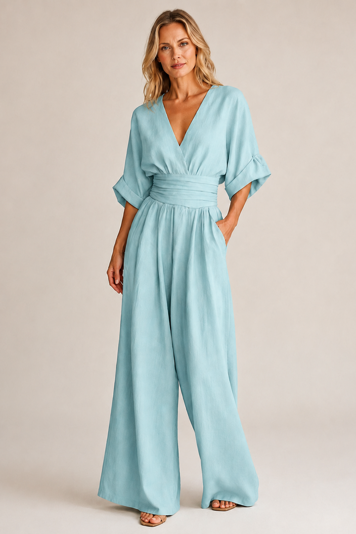 Women's wide-leg jumpsuit with V-neckline, ruched waist, and half sleeves