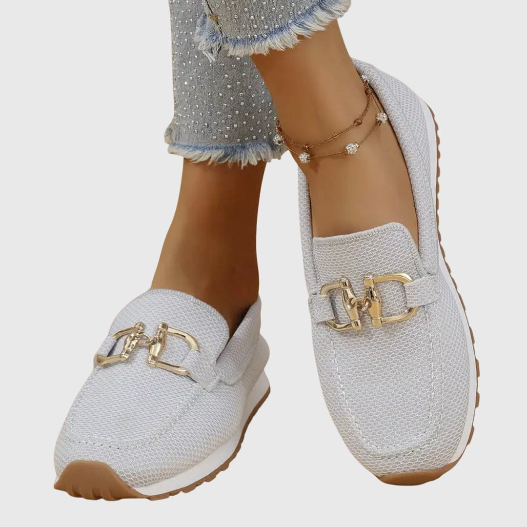 Orthopedic loafer sneakers with round toes and metal buckle detail