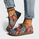 Patterned canvas lace-up trainers with a speckled flatform sole