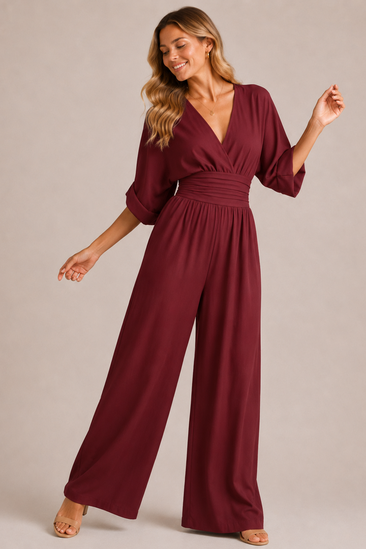 Women's wide-leg jumpsuit with V-neckline, ruched waist, and half sleeves
