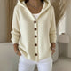Women's pink and cream hooded cardigan with brown button front, shown in relaxed fit with pockets