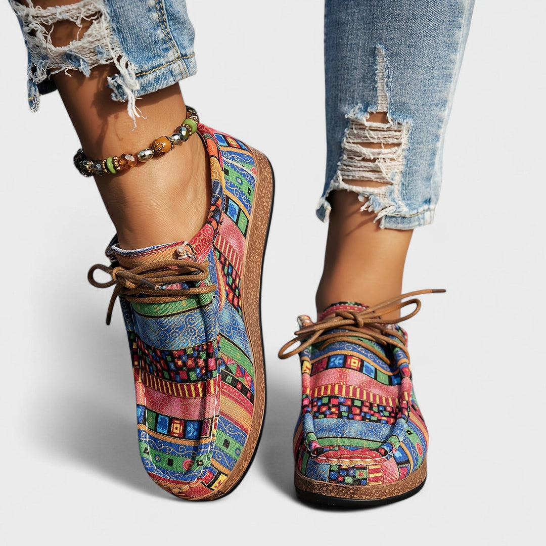 Patterned canvas lace-up trainers with a speckled flatform sole