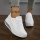Women's low-top lace-up sneakers with printed uppers and raised soles