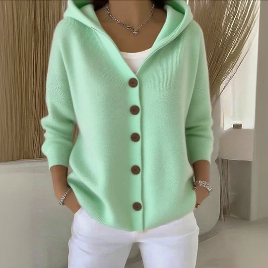 Women's pink and cream hooded cardigan with brown button front, shown in relaxed fit with pockets