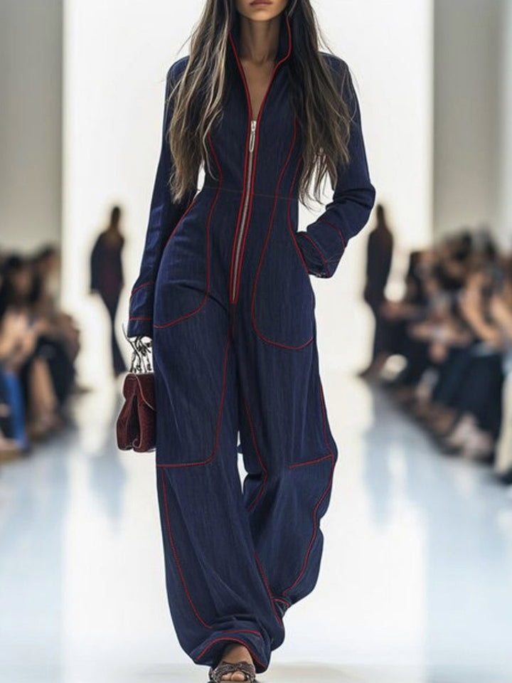 Women's wide-leg jumpsuit with stand collar and front zip, shown in burgundy and pink
