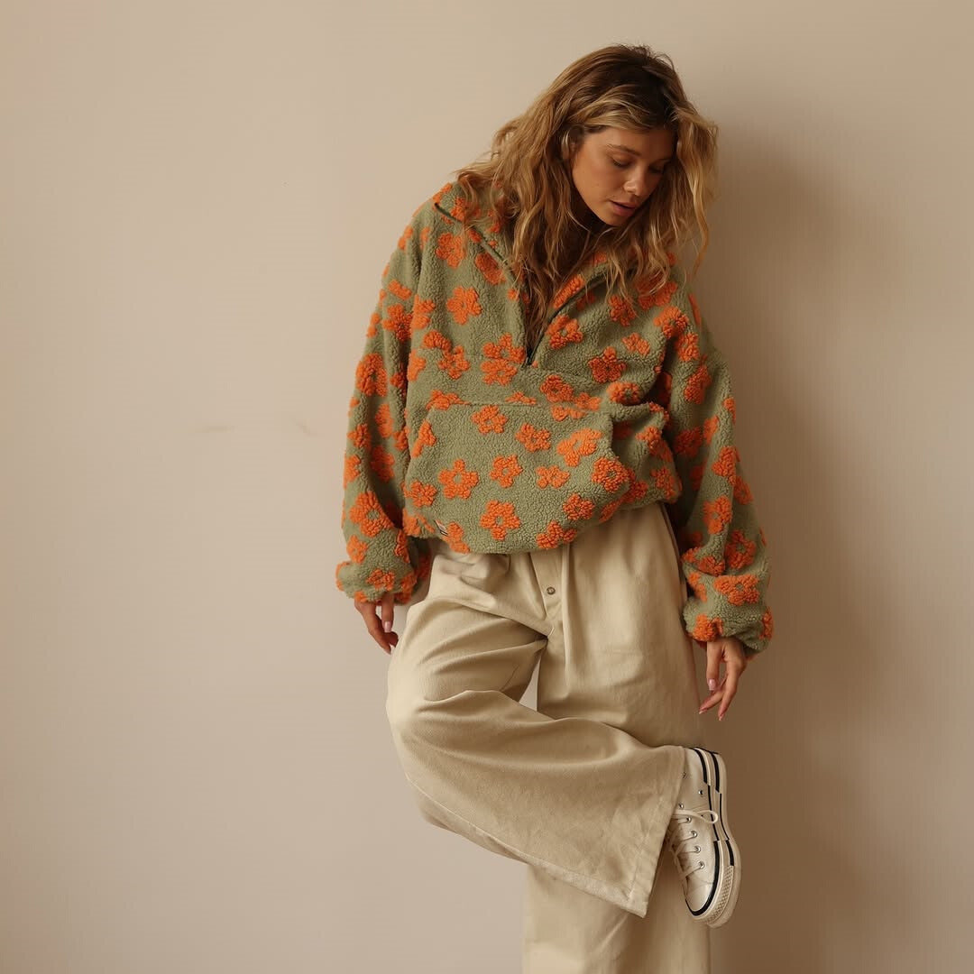 Women's floral half-zip pullover sweater with raised collar