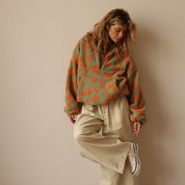 Women's floral half-zip pullover sweater with raised collar