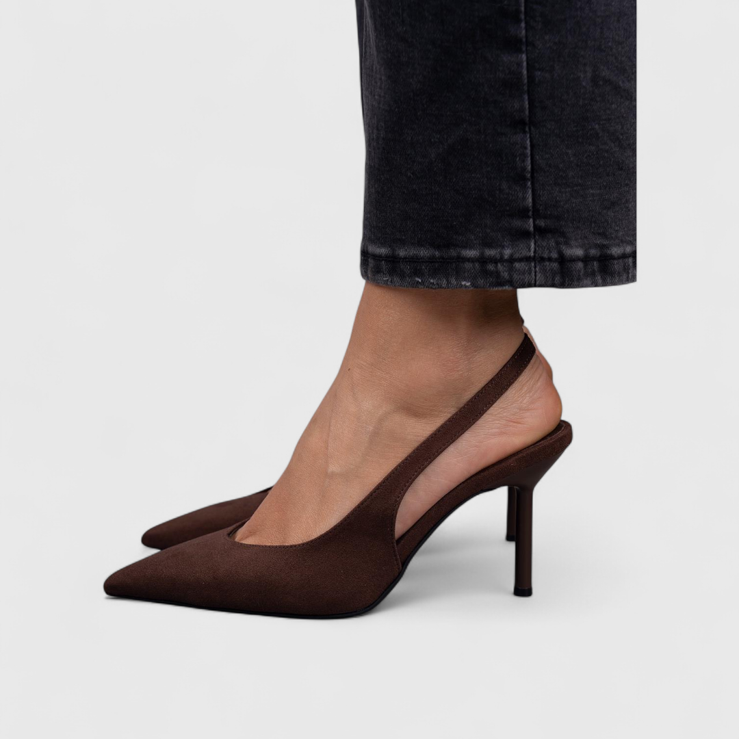 Women's beige pointed-toe slingback heels with thin stiletto heel
