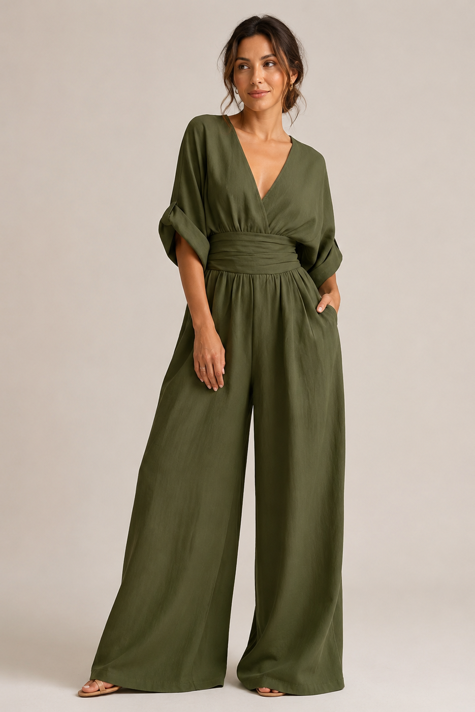 Women's wide-leg jumpsuit with V-neckline, ruched waist, and half sleeves