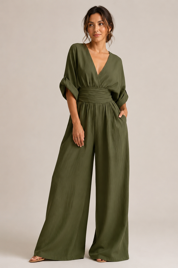 Women's wide-leg jumpsuit with V-neckline, ruched waist, and half sleeves