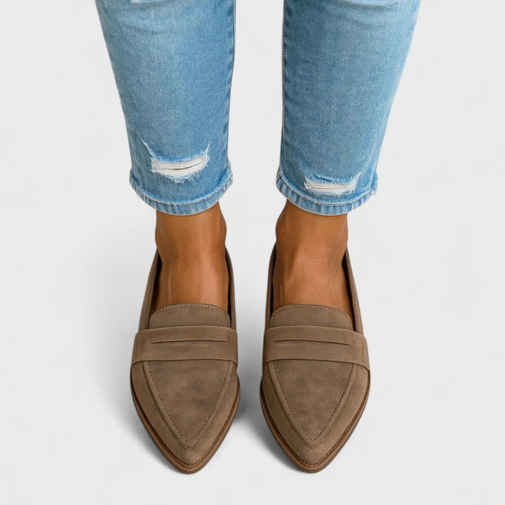 Women's pointed toe loafers with penny strap detail