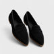 Women's pointed toe loafers with penny strap detail