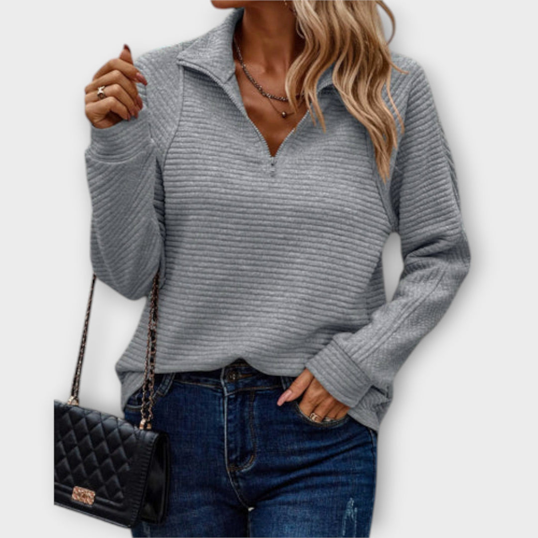 Women's ribbed half-zip sweater with raised mock collar