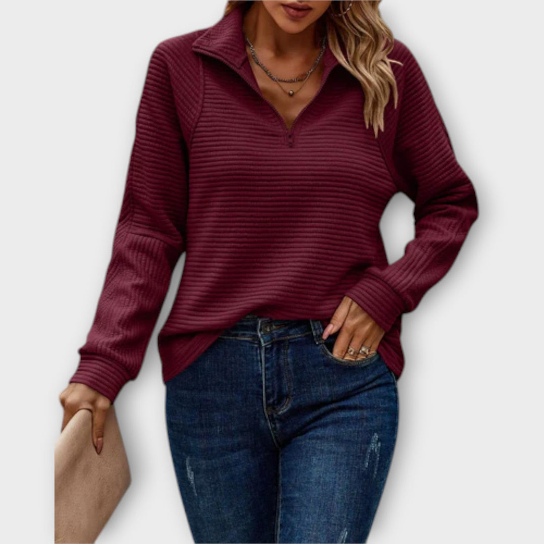 Women's ribbed half-zip sweater with raised mock collar