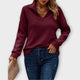 Women's ribbed half-zip sweater with raised mock collar