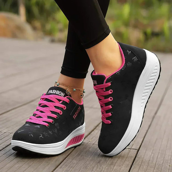 Women's low-top lace-up sneakers with printed uppers and raised soles