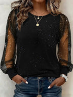 Women's sheer mesh top with glitter star detail and long lantern sleeves, shown in wine and black