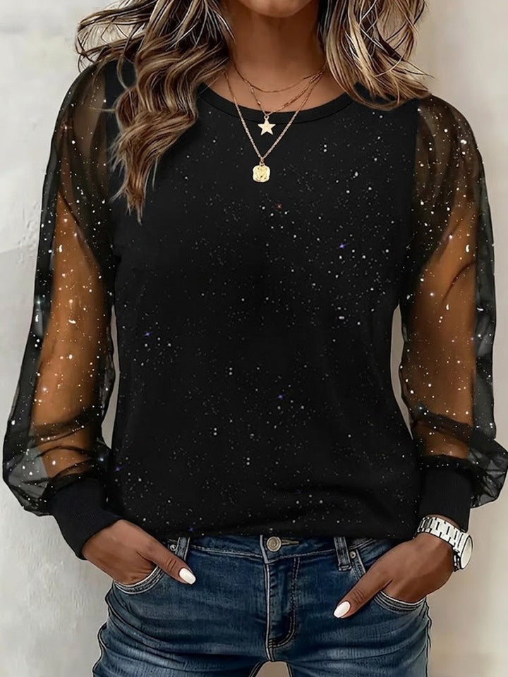 Women's sheer mesh top with glitter star detail and long lantern sleeves, shown in wine and black