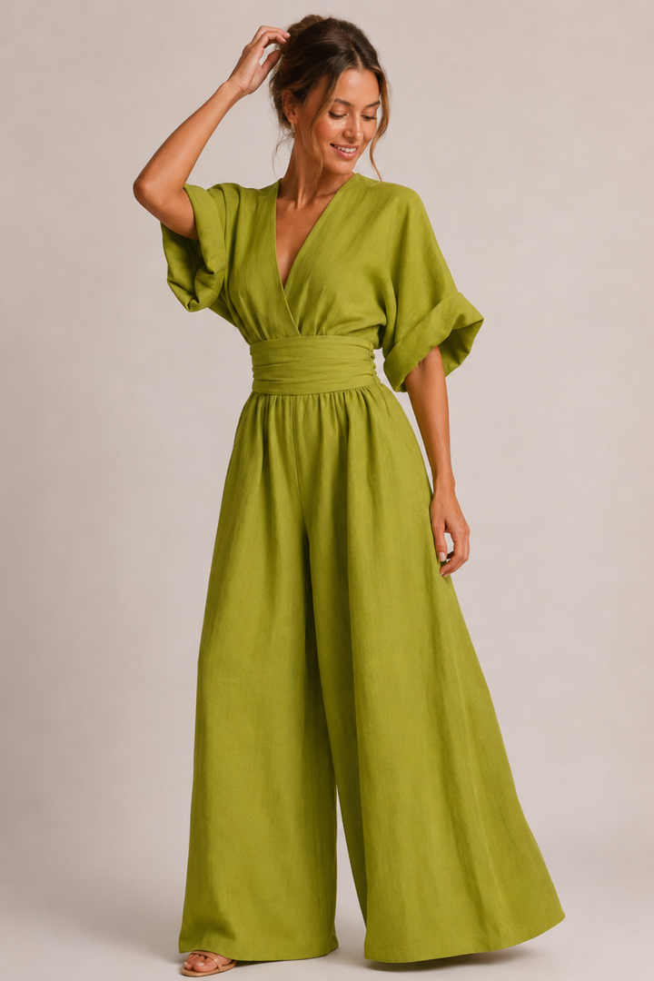 Women's wide-leg jumpsuit with V-neckline, ruched waist, and half sleeves
