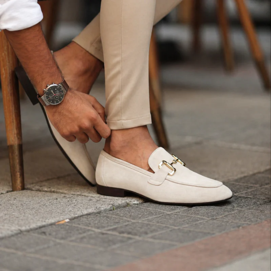 Men's plain loafers with decorative metal buckle and almond toe