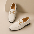 Men's plain loafers with decorative metal buckle and almond toe