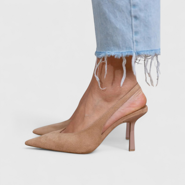 Women's beige pointed-toe slingback heels with thin stiletto heel