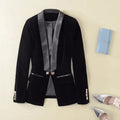 Women's velvet blazer with shawl collar, buttons and flap pockets