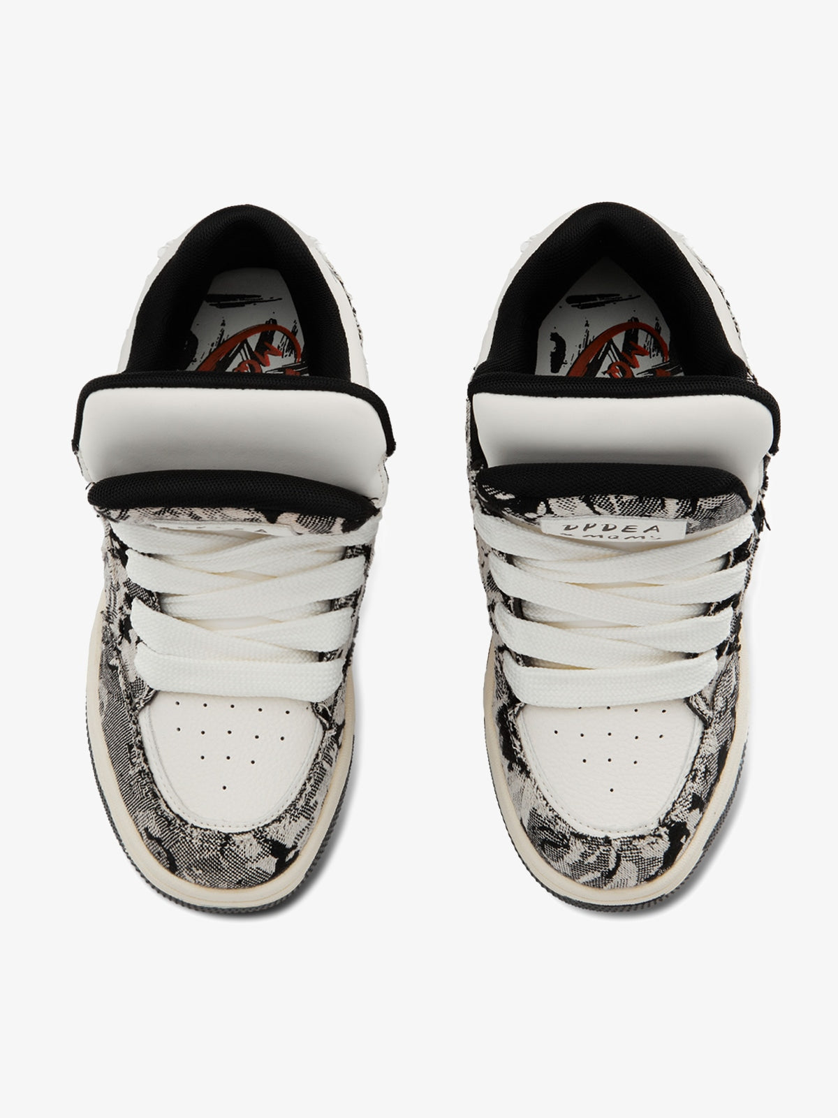 Black camouflage high-top board sneakers with white laces