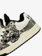 Black camouflage high-top board sneakers with white laces