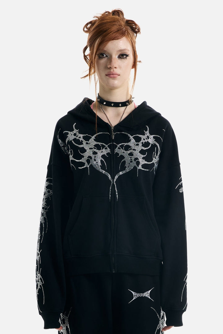 Women's black zip-up hoodie with rhinestone wing and thorn graphics