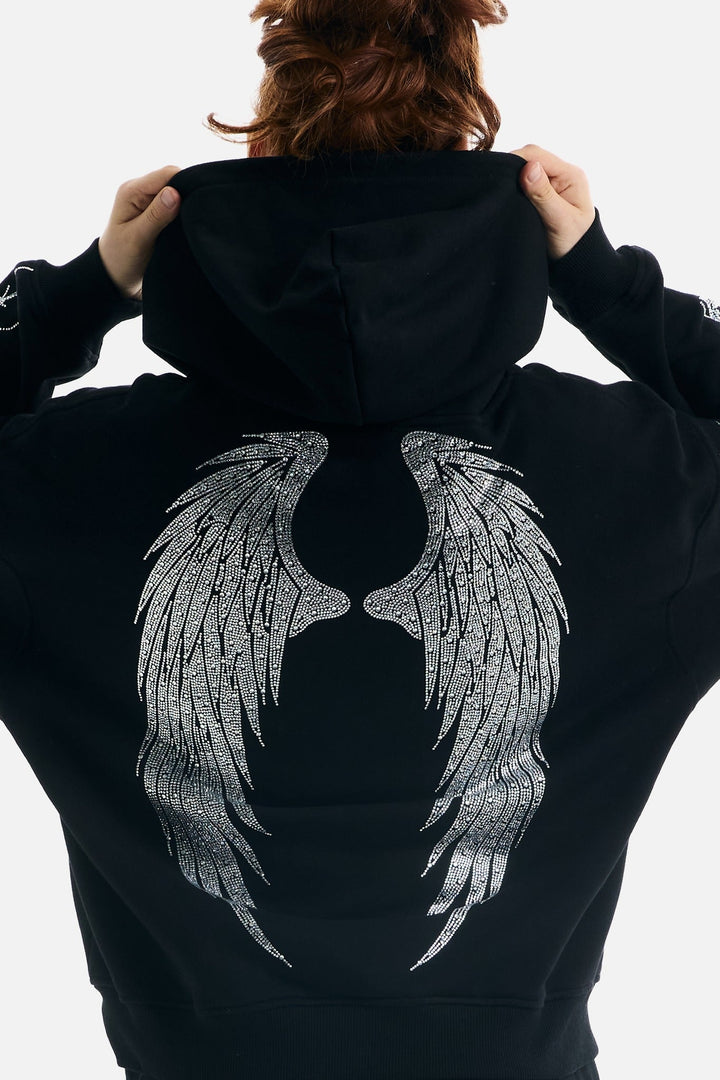 Women's black zip-up hoodie with rhinestone wing and thorn graphics