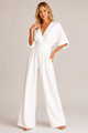 Women's wide-leg jumpsuit with V-neckline, ruched waist, and half sleeves