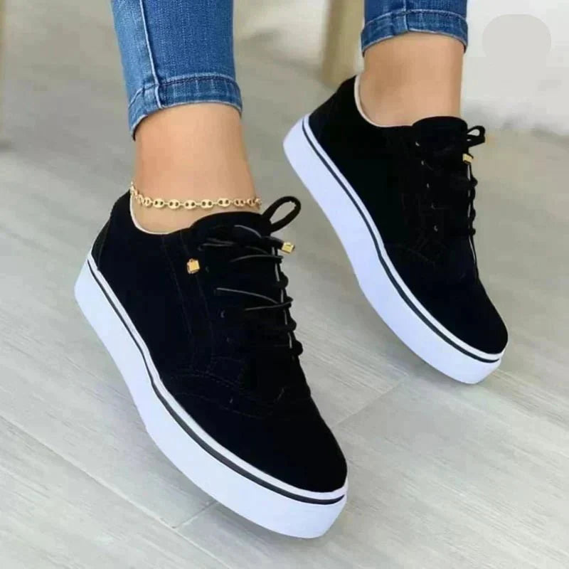 Women's lace-up sneakers with perforated brogue-style detailing