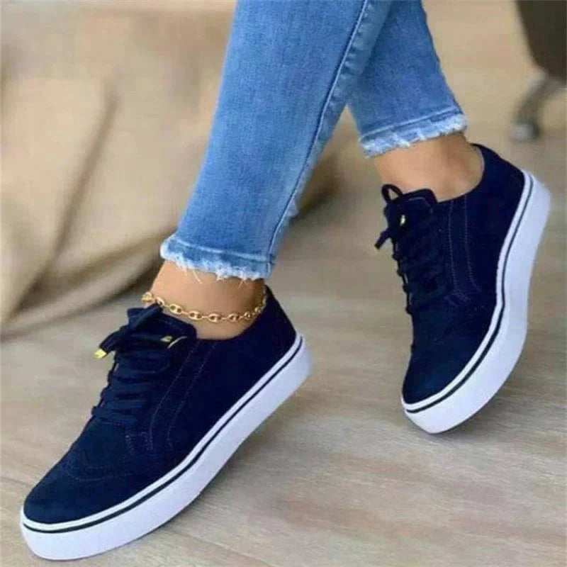 Women's lace-up sneakers with perforated brogue-style detailing