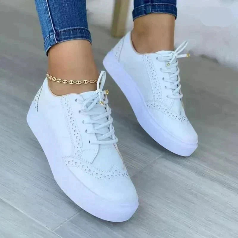 Women's lace-up sneakers with perforated brogue-style detailing
