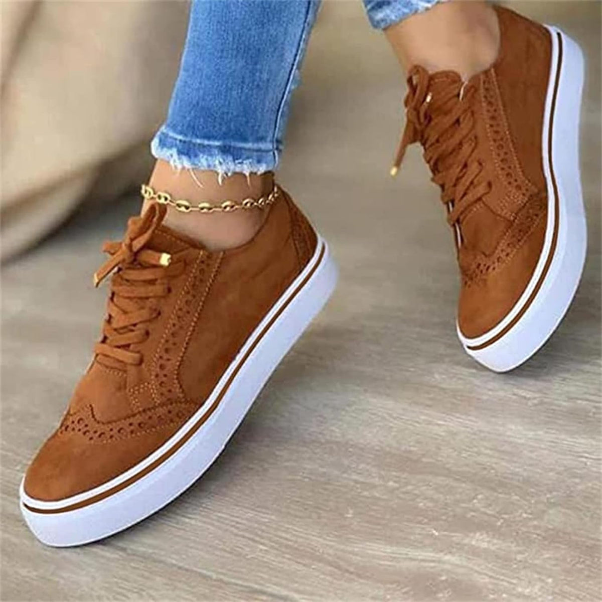 Women's lace-up sneakers with perforated brogue-style detailing
