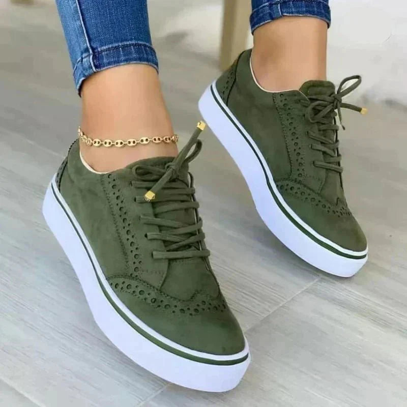 Women's lace-up sneakers with perforated brogue-style detailing